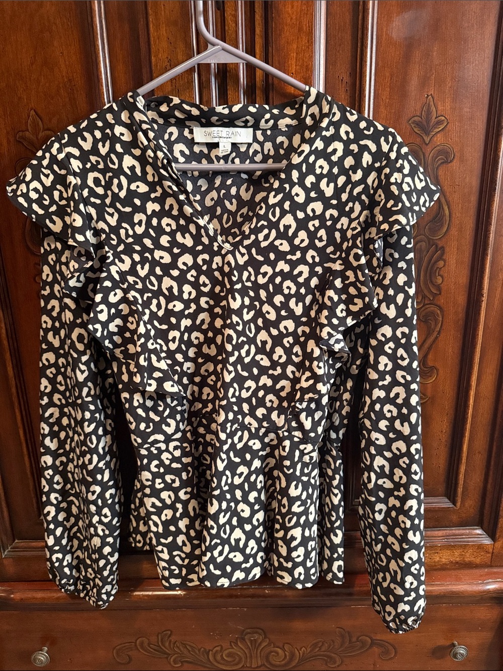 Sweet Rain Black and Cream Leopard Ruffle V-Neck Blouse